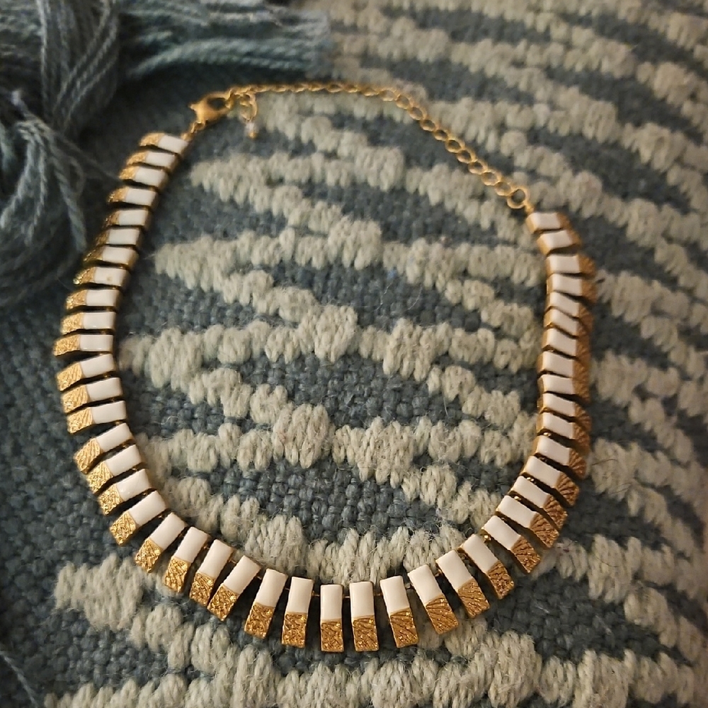 Elegant Gold and White Necklace